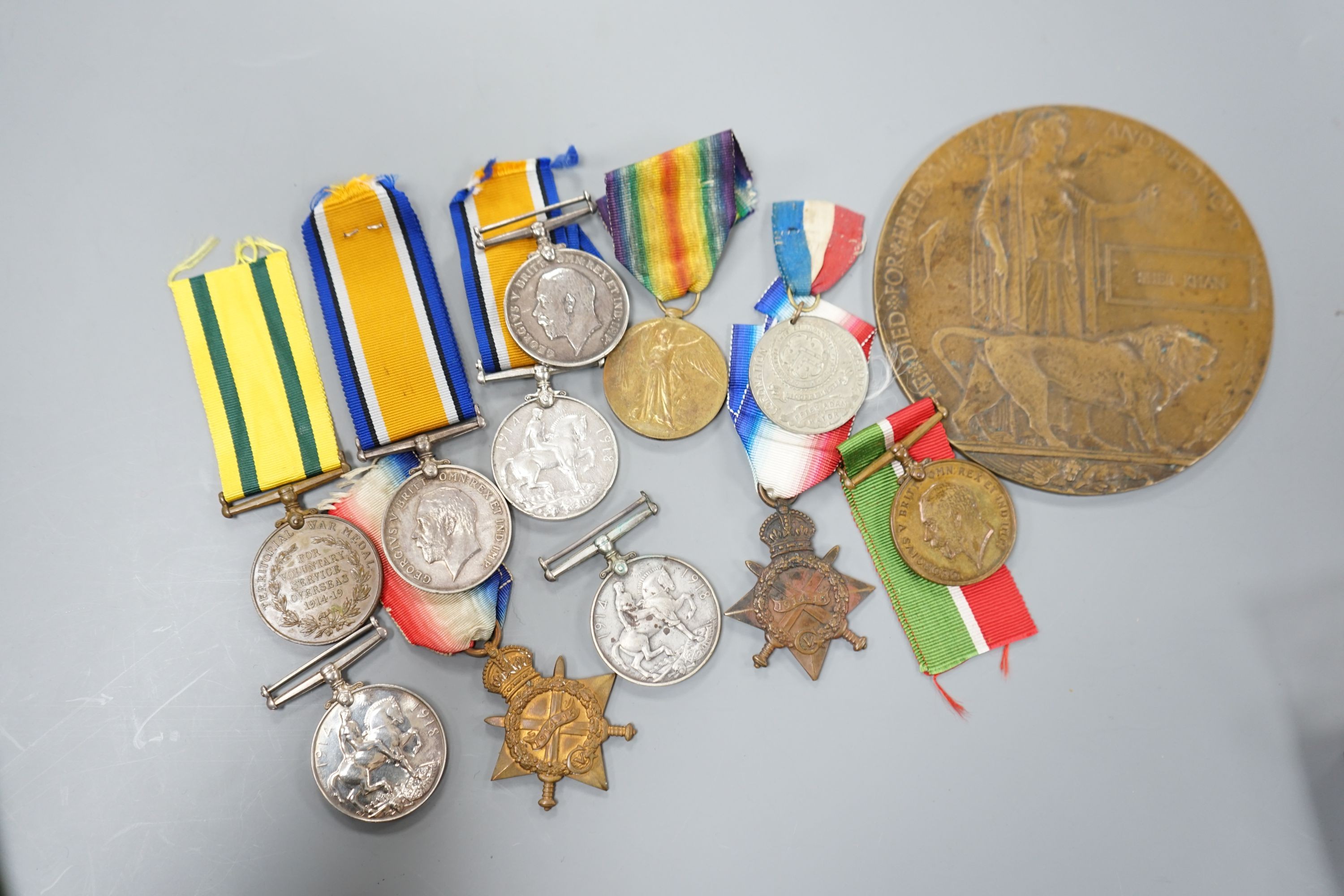 A collection of of odd WW1 medals to different recipients and a bronze death plaque to Shah Khan